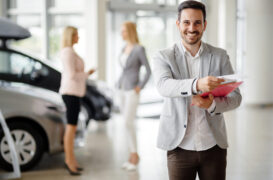 Salesperson,At,Car,Dealership,Selling,Vehichles