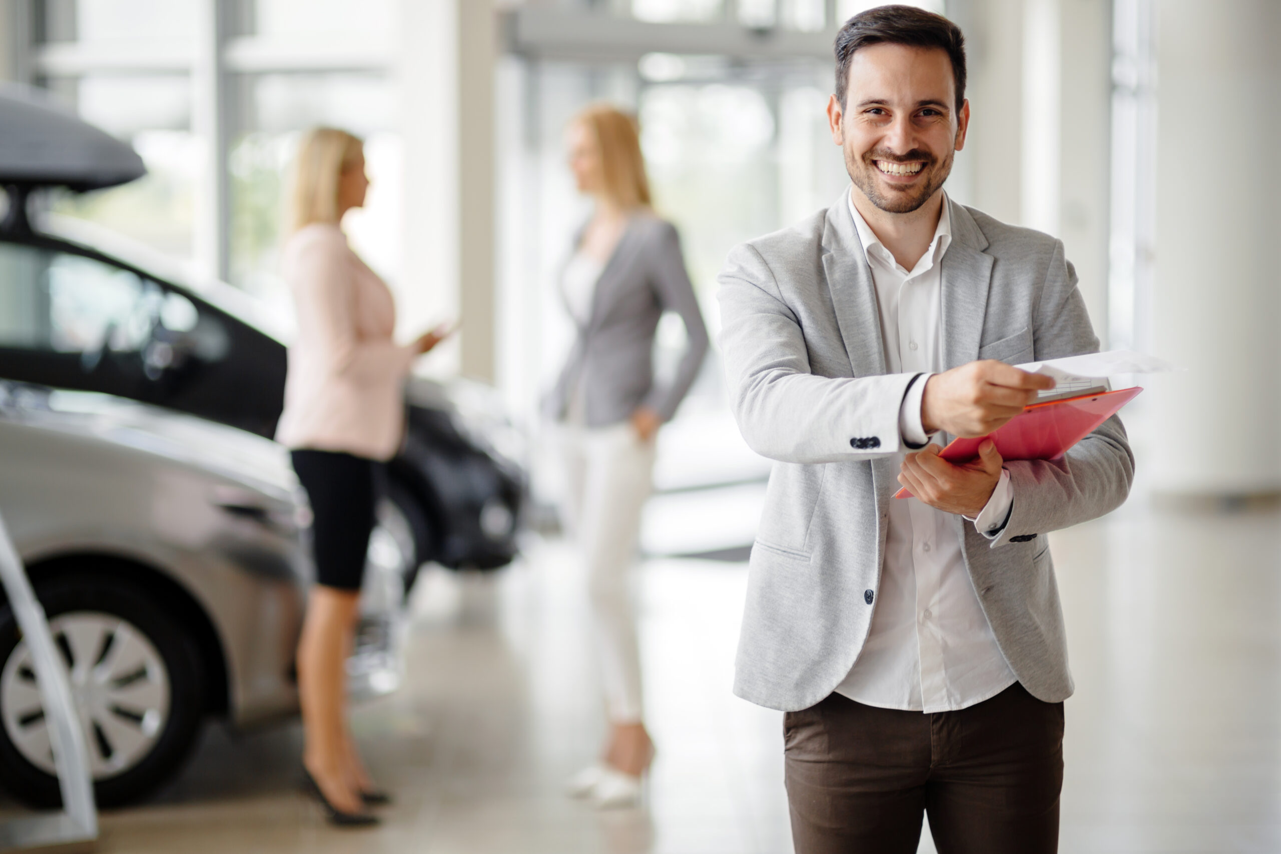 Salesperson,At,Car,Dealership,Selling,Vehichles